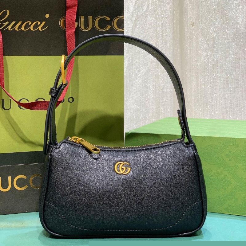 G*u*i top handle bags